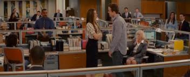 Andrew finds her in the office and tells her he loves her and wants to marry her