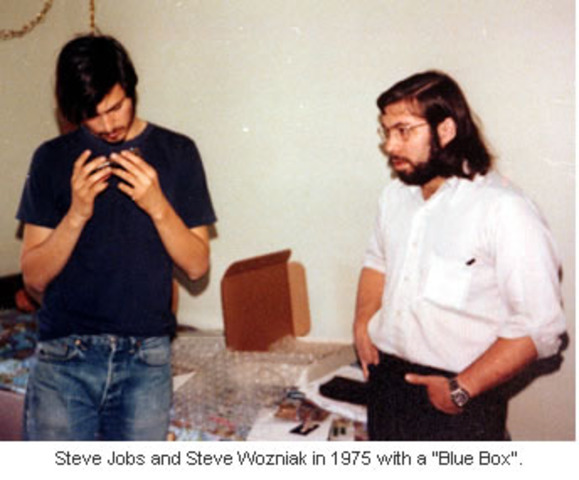 Jobs and friend Steve Wozniak show the early Apple I board at the Homebrew Computer Club