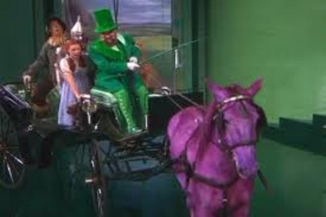 When they get inside Emerald Palace, they get pampered up, and ride in a carraige with a clor changing horse.
