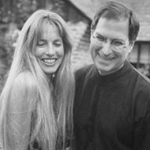 Marries Laurene Powell