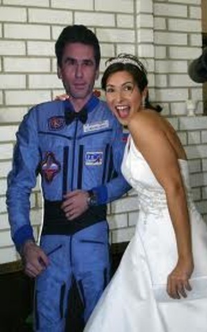 Yuri Ivanovich Malenchenko becomes the first person to marry in space.