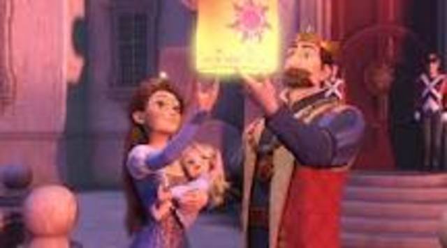 To celebrate Rapunzels birth the King and Queen light lanterns and lift them into the air