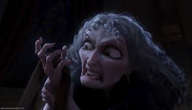 Gothel cuts a piece of Rapunzels hair and it turns brown