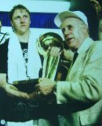 Red Auerbach was hired to coach the Boston Celtics