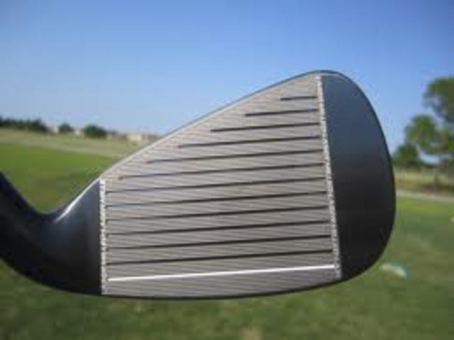 The first grooved-faced irons are invented.