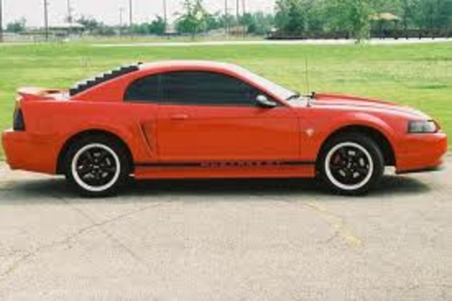 My short term goal is to buy a used Ford Mustang by next summer.