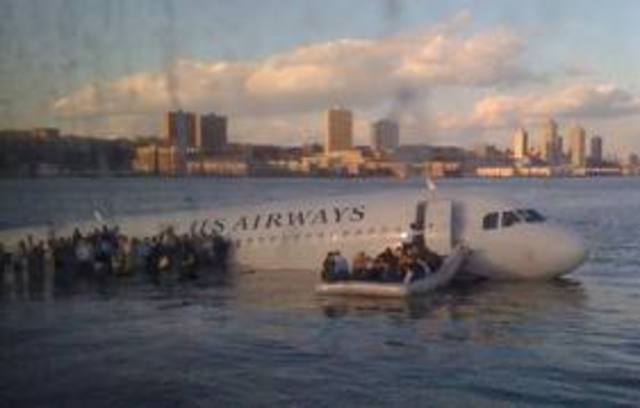 US Airways flight 1549 makes a landing in the Hudson River