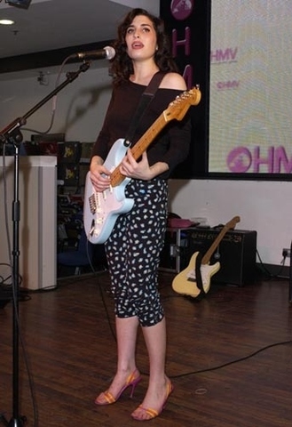 She signs with Simon Fuller's management company 19 Entertainment, then Island Records.