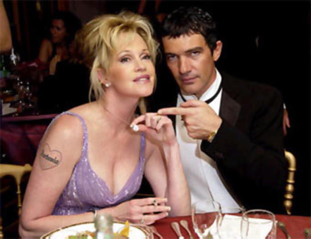 he met the actress melanie Griffith in 1995 when he was in a movie with her