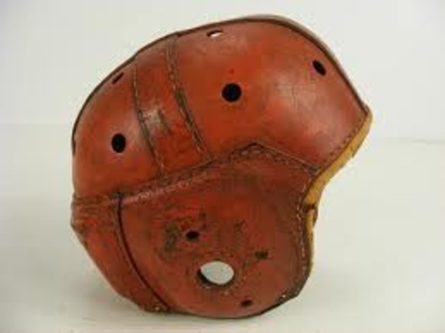 first football helmet makes apearence