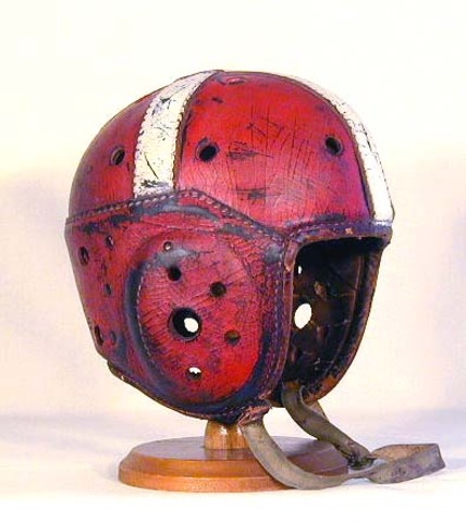 George Barclay invents the helmet with straps