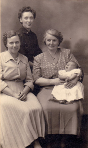 My Great Great grandmother is holding my Great grandmother in the mid 1920's in Rochester NY