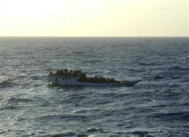 Refugee boat sinks; Australian PM aims to revive Malaysia plan