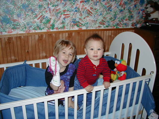 me and sister in crib