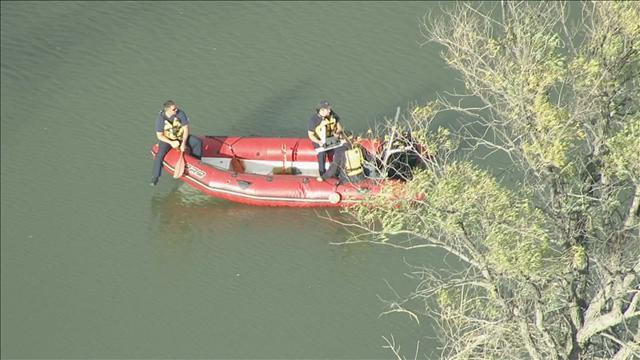 Officials search terrain and lakes
