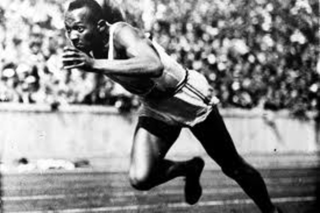 Jesse Owens wins Gold