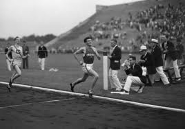 Louis Finishes Second in USC Track Meet