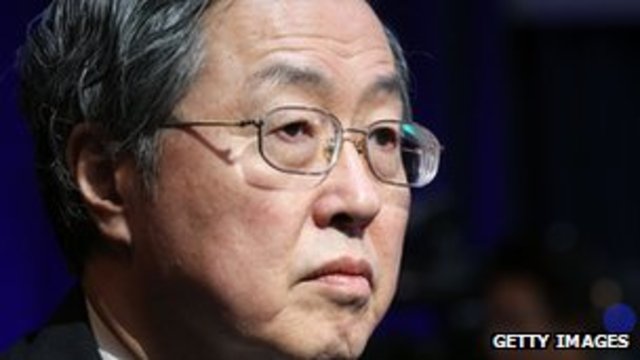 Chinese bank governor skips key meeting in Japan