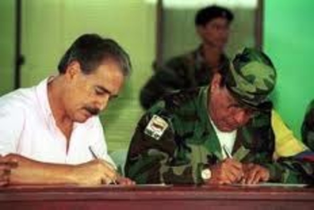 firman acuerdo de paz