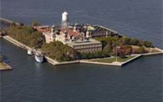 Arrives at Ellis Island