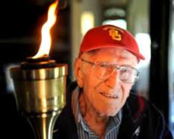 Louis Carries the Olympic Torch Through Naoetsu