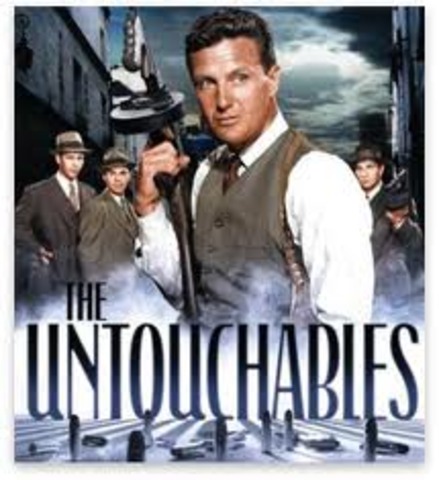 Plays Agent George Stone/Giuseppe Petri in The Untouchables with Robert De Niro, Sean Connery, and Kevin Costner.