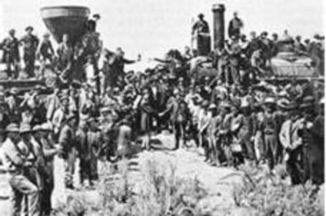Last tie of Transcontinental RR hammered in