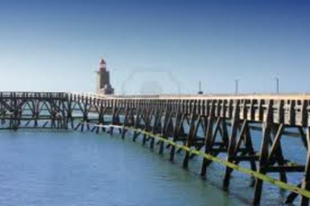 As the ship leaves port