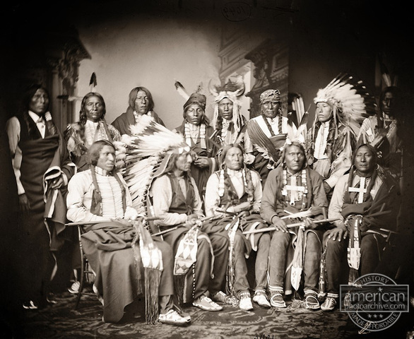 Photographs Red Cloud and his warriors in Washington