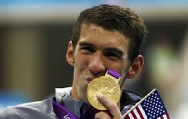 Michael Phelps breaks the gold metal record.