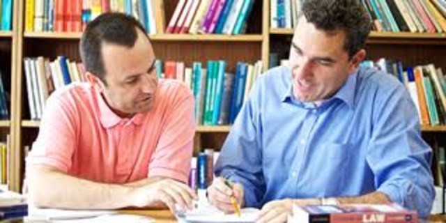 Dr. John Eaton and Dr. Victor Clark establish that Puerto Rican teachers should learn English to obtain better opportunities on being hired.