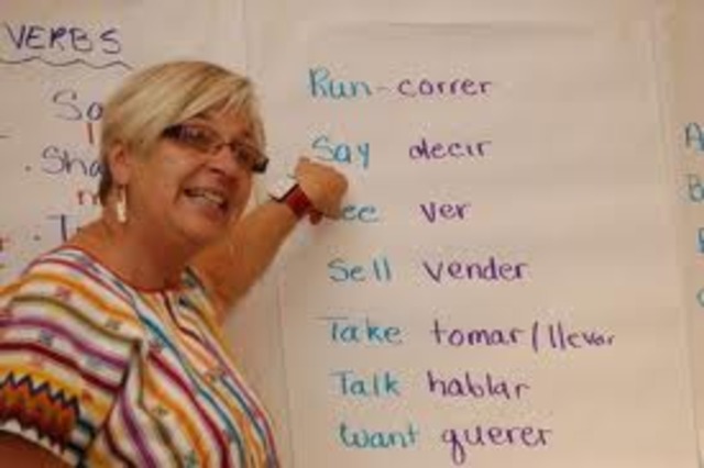 Half in Spanish, Half in English.