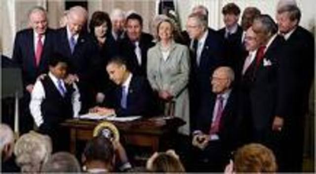 Obama Signs Health Care Bill