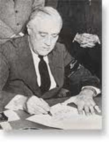 President Roosevelt signs executive order No. 9066