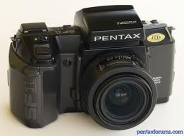 1st AF SLR with built-in auto flash