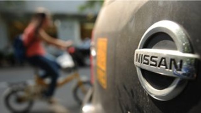 Nissan cuts full-year profit