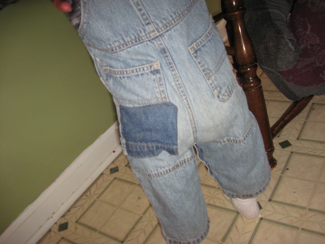 Jem gets his fixed pants in the tree