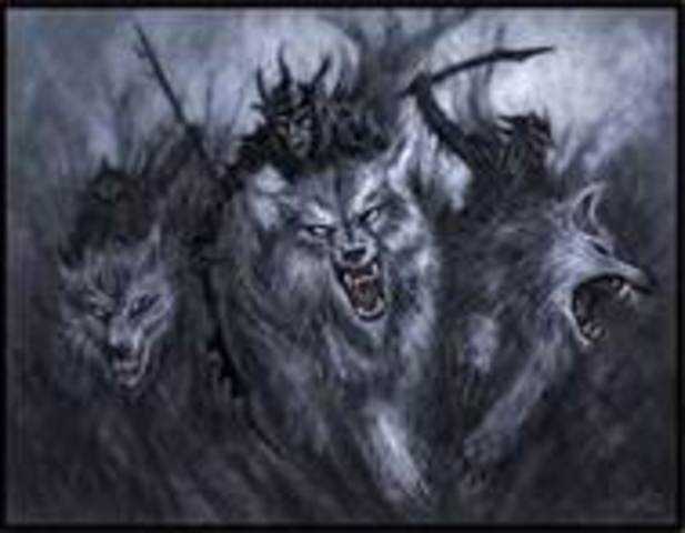 Bilbo and Co. are forced into trees by Wargs.