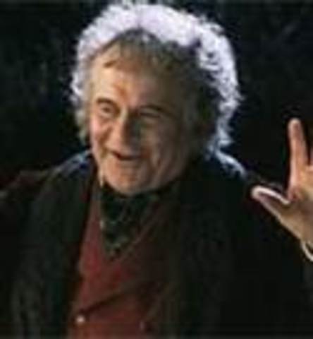 Gandalf and Balin check in on Bilbo and he has REAL gold buttons.