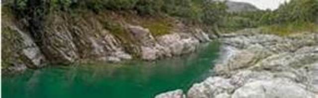 Bilbo sends all the dwarves down the river to Lake-town.