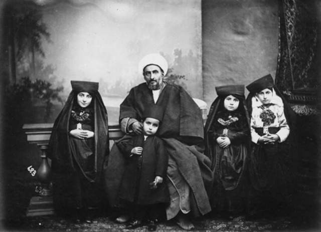 Shah is forced into exile