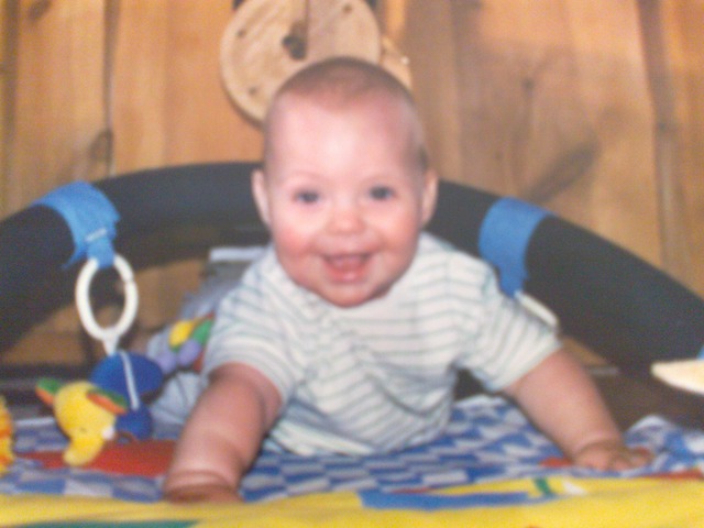 Thomas is crawling on his bed in Sweden, Sødertelje