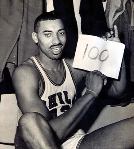 Wilt Chamberlain scores 100 points in a single game