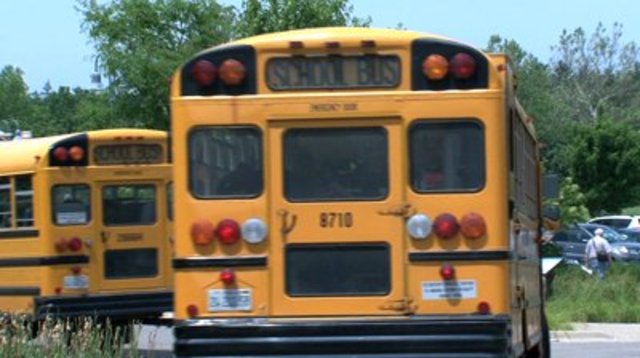 Dean's bus meets with the grammar school bus. Exposition