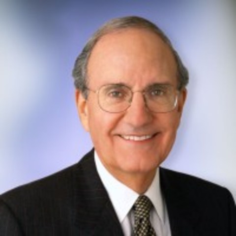 George Mitchell brokers peace agreement.
