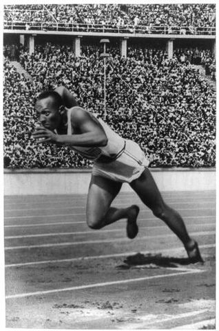 Jesse Owens wins Four Golds in Olympics