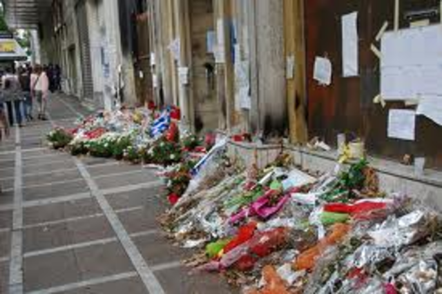 Protesters set Marfin Bank on fire.