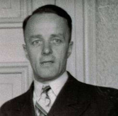 Miep and Mr. Kraler Bring the Franks and the Van Daans Gifts for the New Year