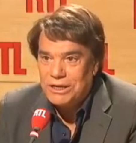 Bernard Tapie passe à la caisse