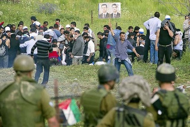 israeli and protesters clash on syria border